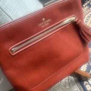 Kate Spade brick red ladies leather bag; new without tags